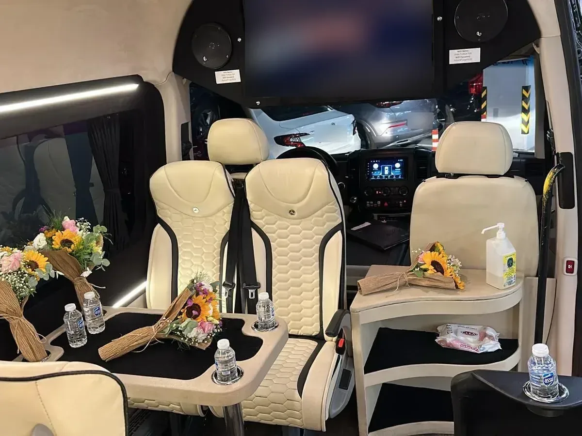 VIP Sprinter cabin with leather seats and tables