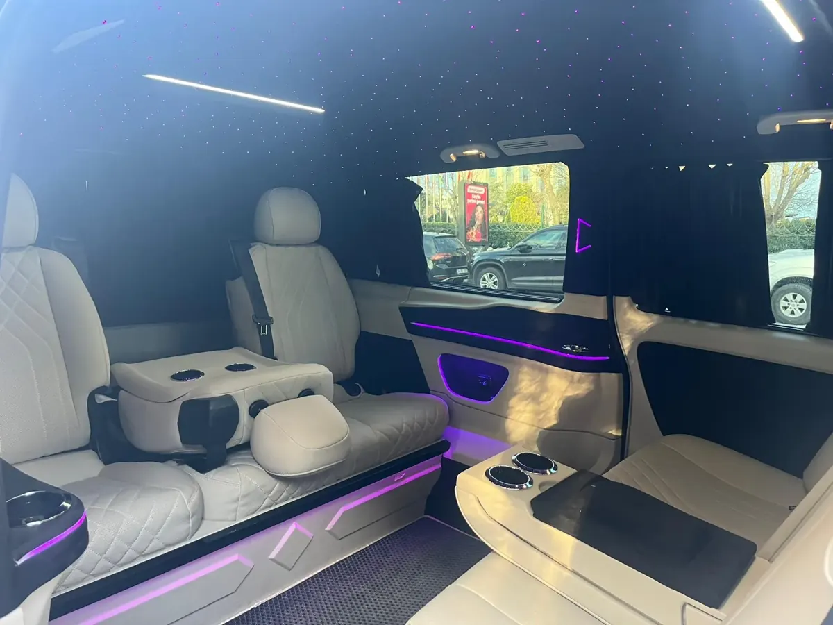 Vito VIP cabin with captain seats and a fold-out table