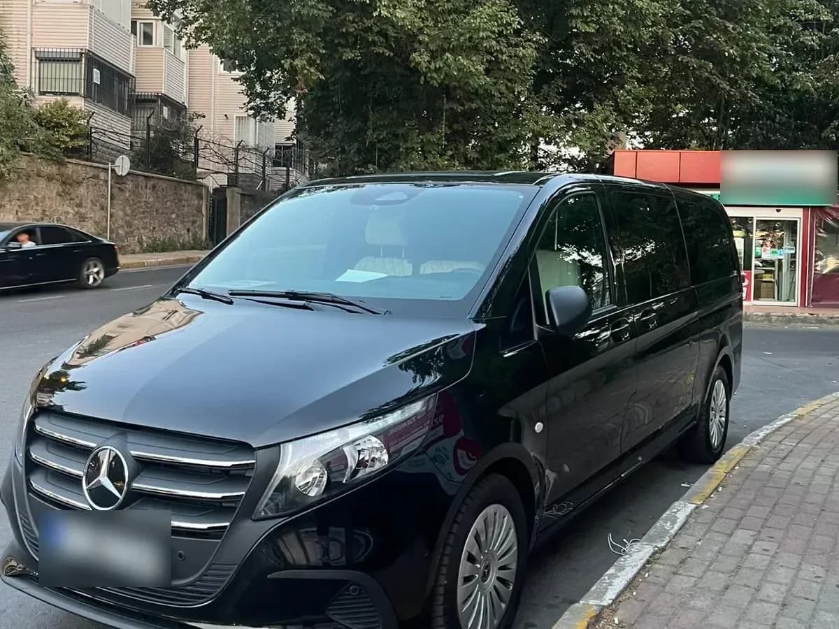 Black Mercedes Vito parked at the kerb